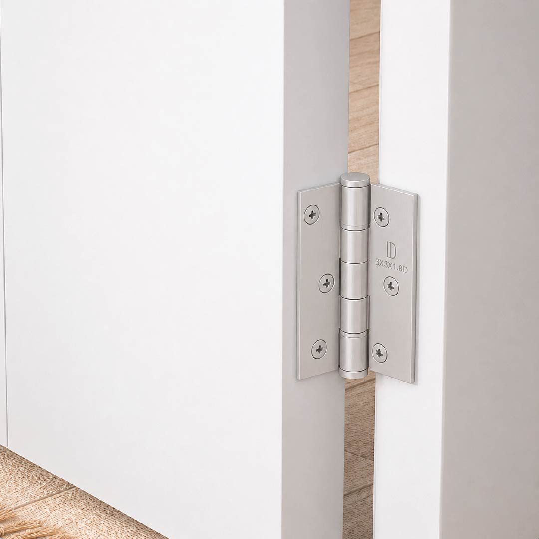 DOMIRA silver steel ball bearing door hinges installed on an external wooden door with durable corrosion-resistant performance.