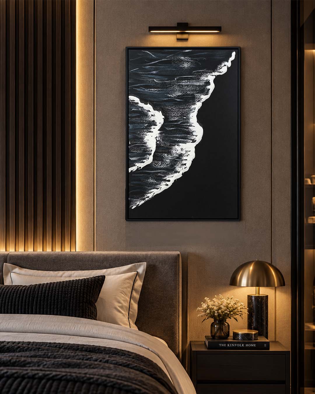 A Quiet Whisper black and white wave painting above a bed in a bedroom