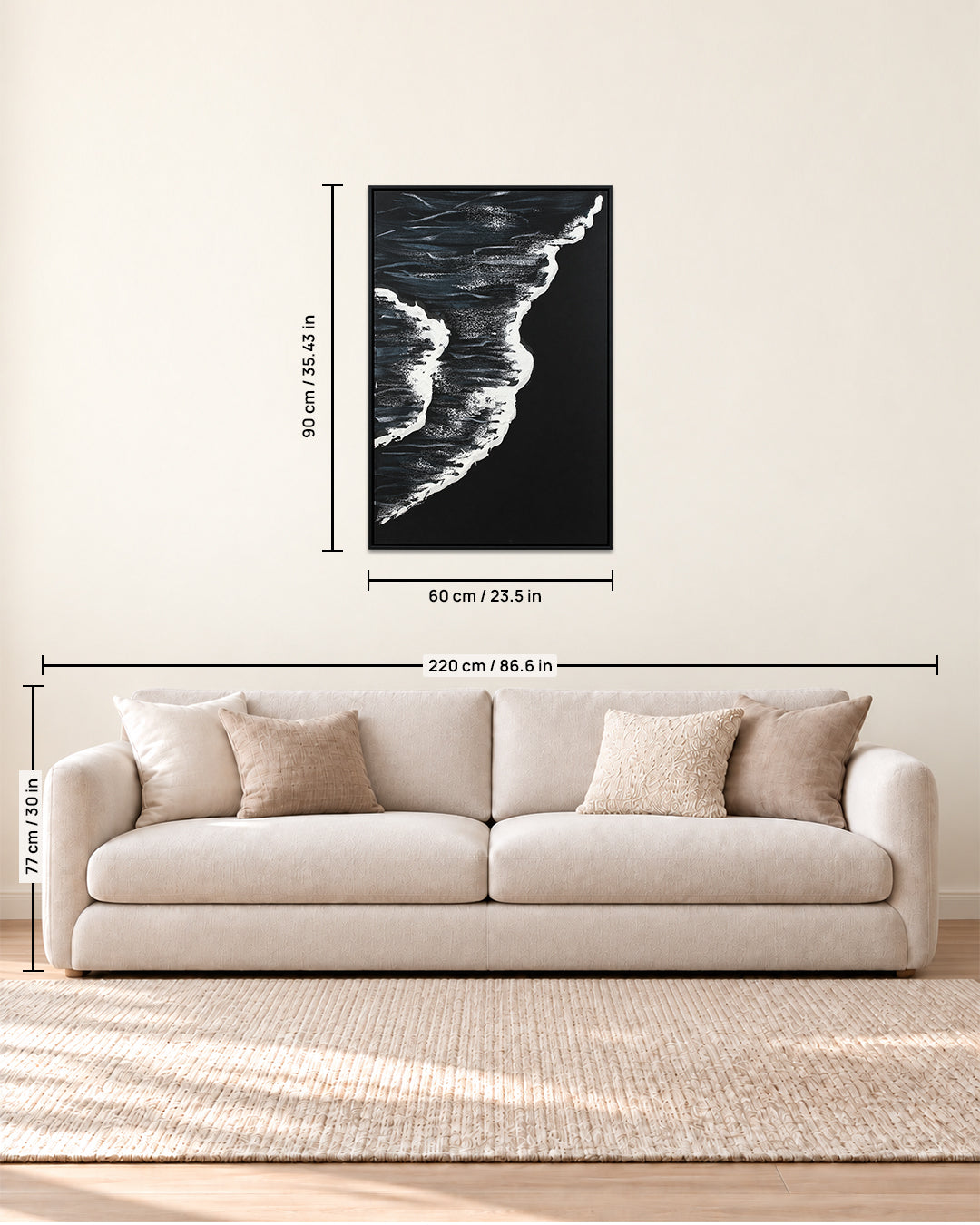 A Quiet Whisper black and white wave painting size guide above a sofa
