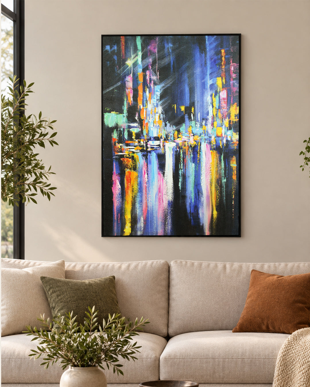 After Hours abstract cityscape painting above a sofa in a living room