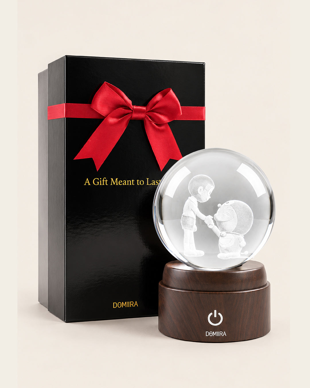 Friends Forever crystal globe beside its ribbon-finished gift box