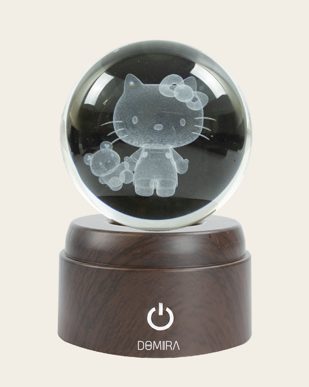Sweet Adventure crystal globe close-up of the 3D engraved design