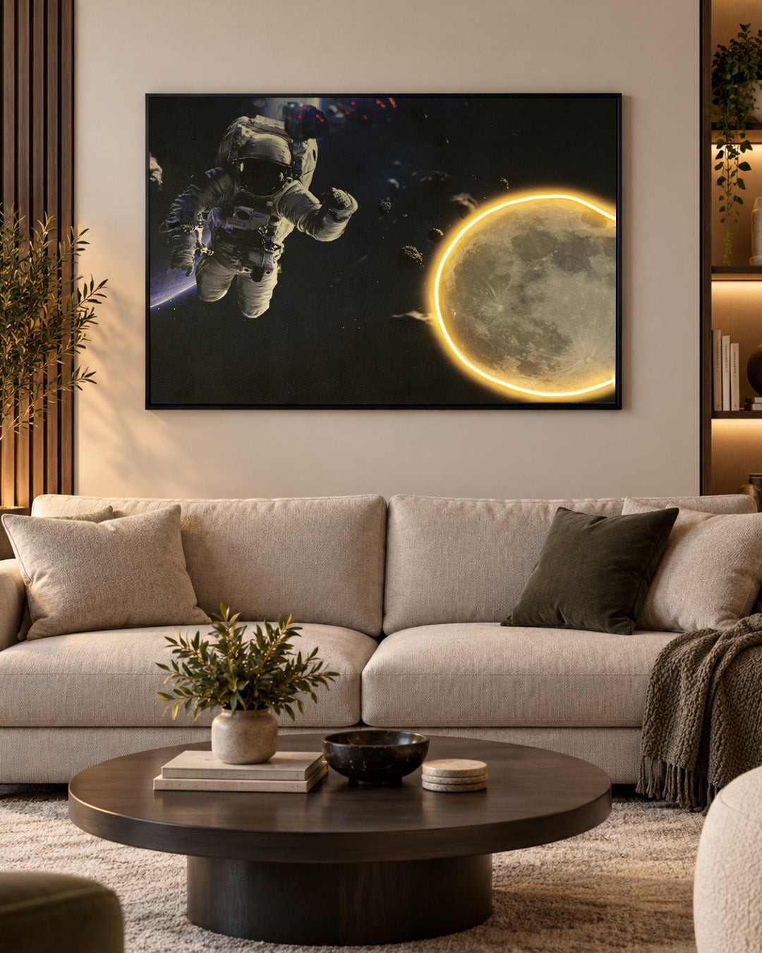 Beyond Infinity astronaut and moon LED wall art in a living room above a sofa