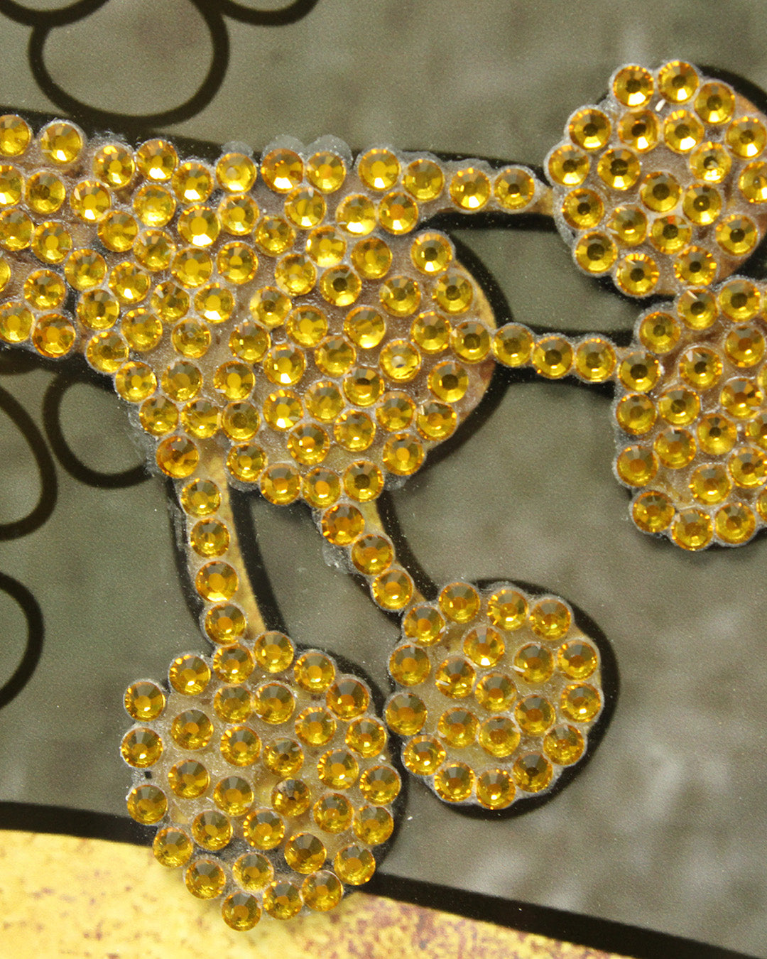 Botanical Muse teal and gold leaf glass wall art close-up of the crystal embellishments