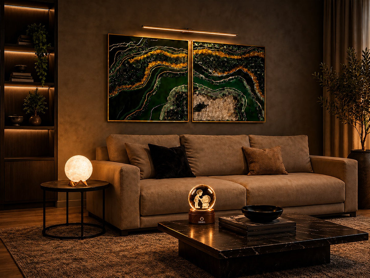 Living room with green and gold resin wall art, a moon lamp and a crystal globe