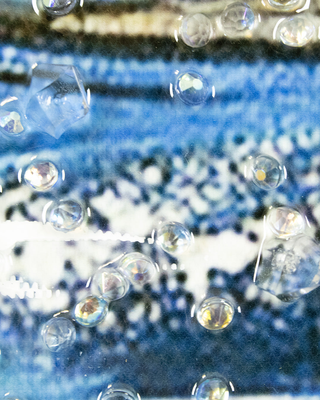 Chasing Horizons sailing boat resin wall art close-up of the resin water surface