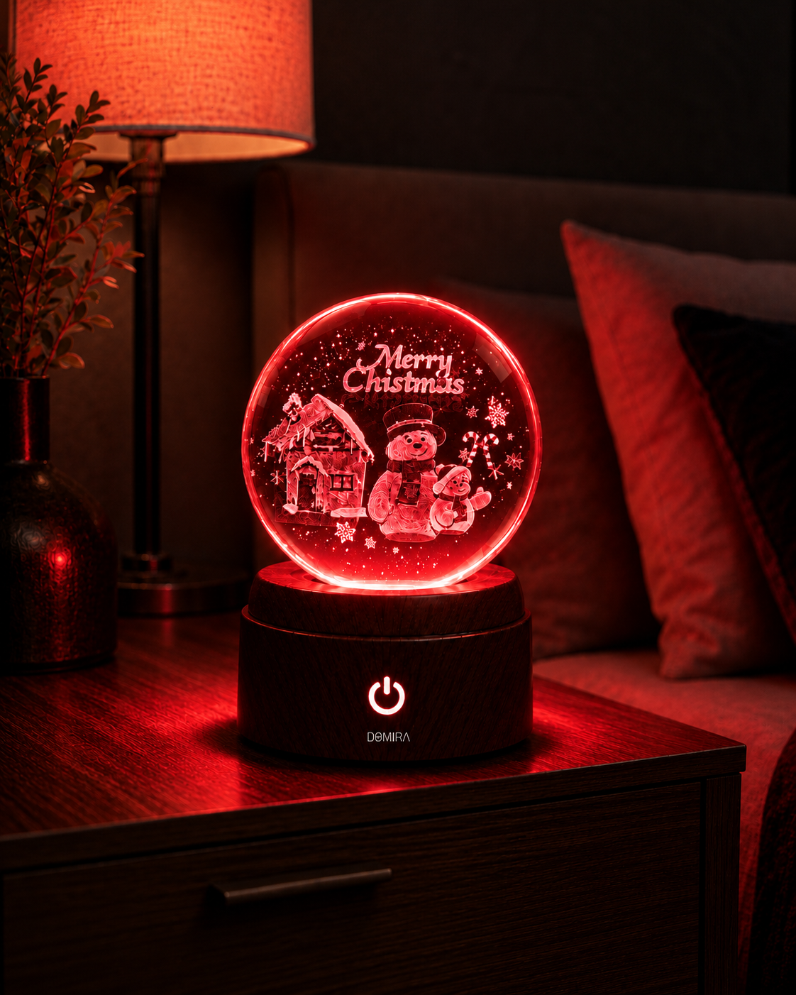 A Snowy Christmas crystal globe glowing red