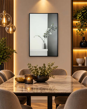 Composed scandinavian plant wall art above a dining table