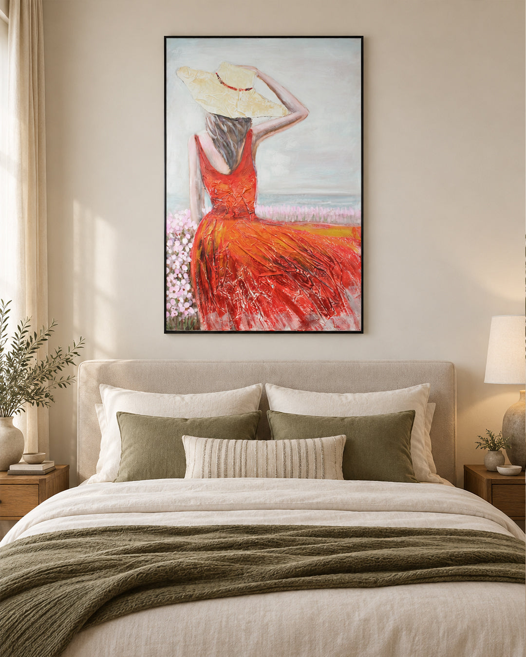 Crimson Shore woman in red dress painting above a bed in a bedroom