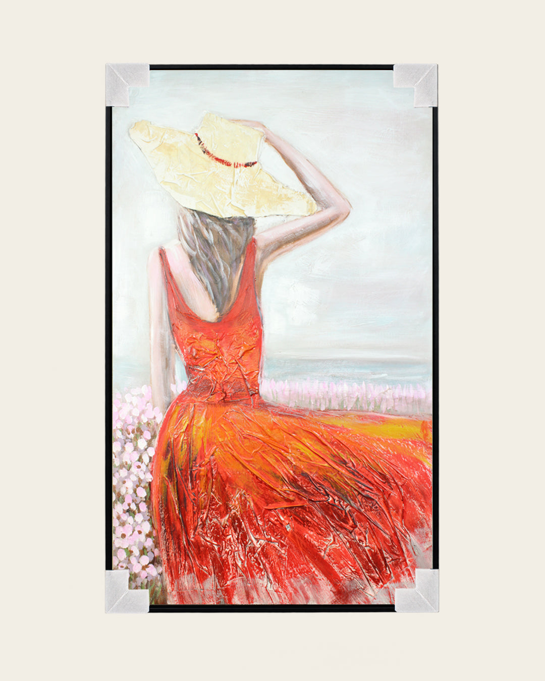 Crimson Shore woman in red dress painting with corner protectors for delivery