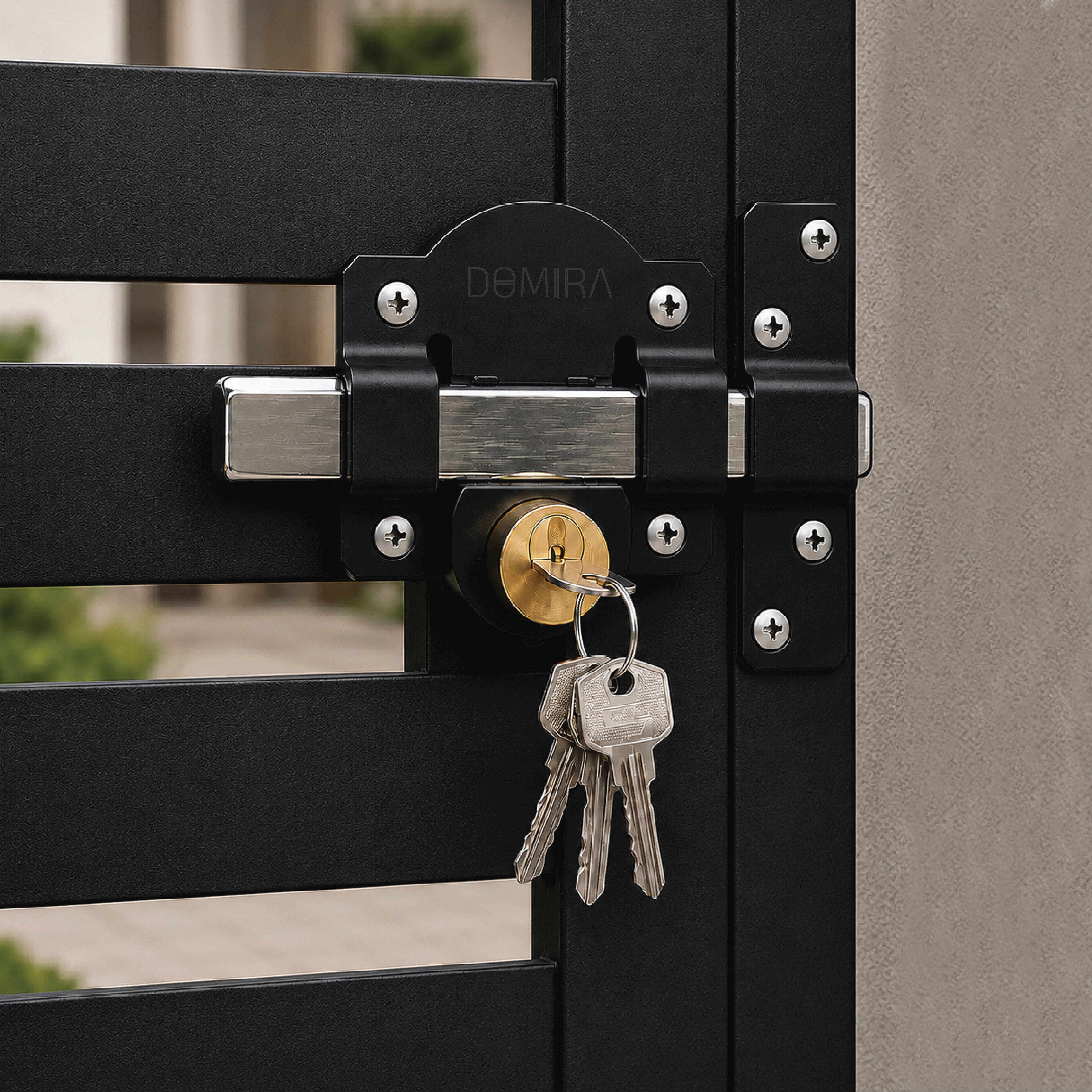 DOMIRA 70mm stainless steel gate lock
fitted to a commercial metal gate for
reliable heavy duty outdoor security.