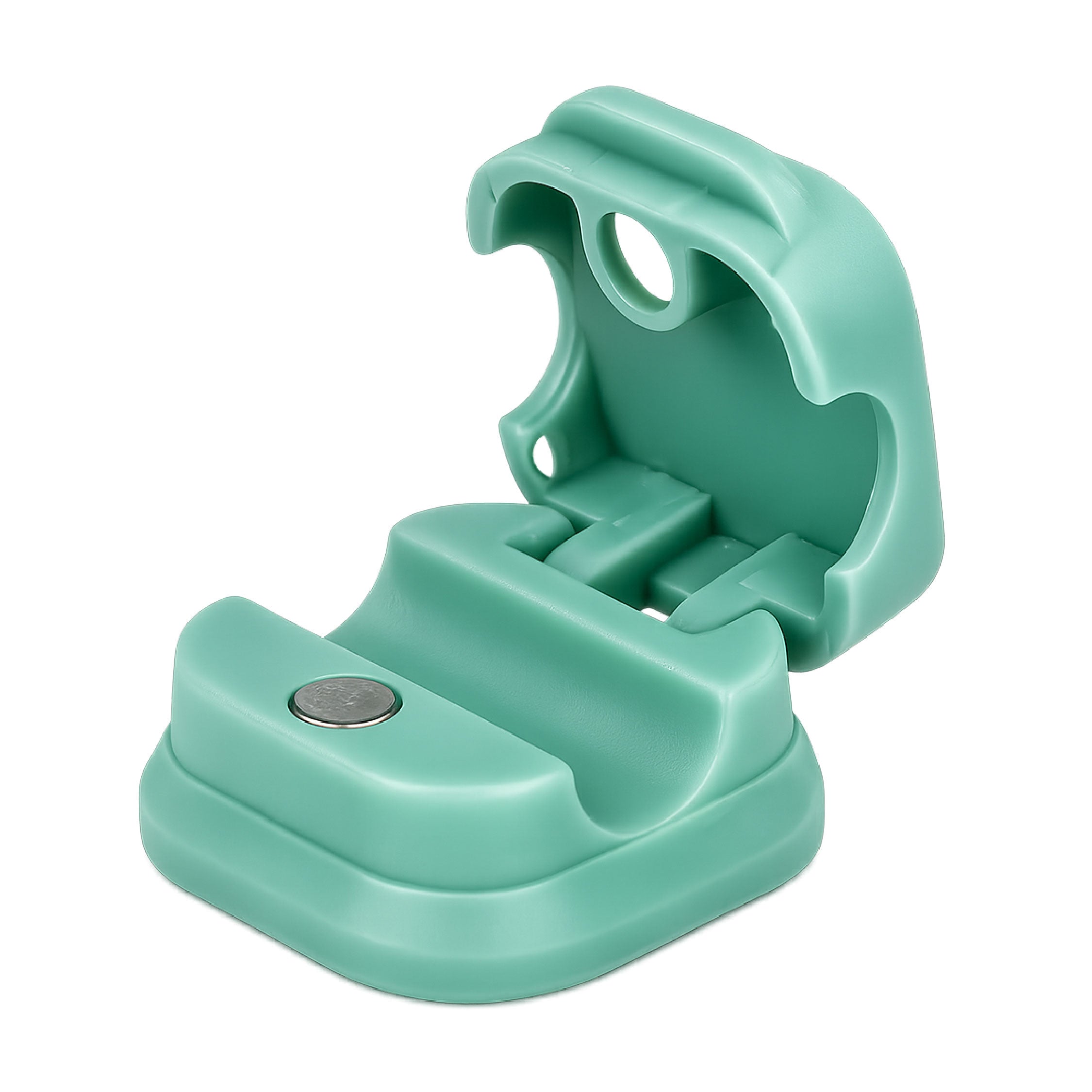 Open view of DOMIRA Green magnetic
cable holder clip showing magnetic
opening mechanism for easy cable
insertion and removal.