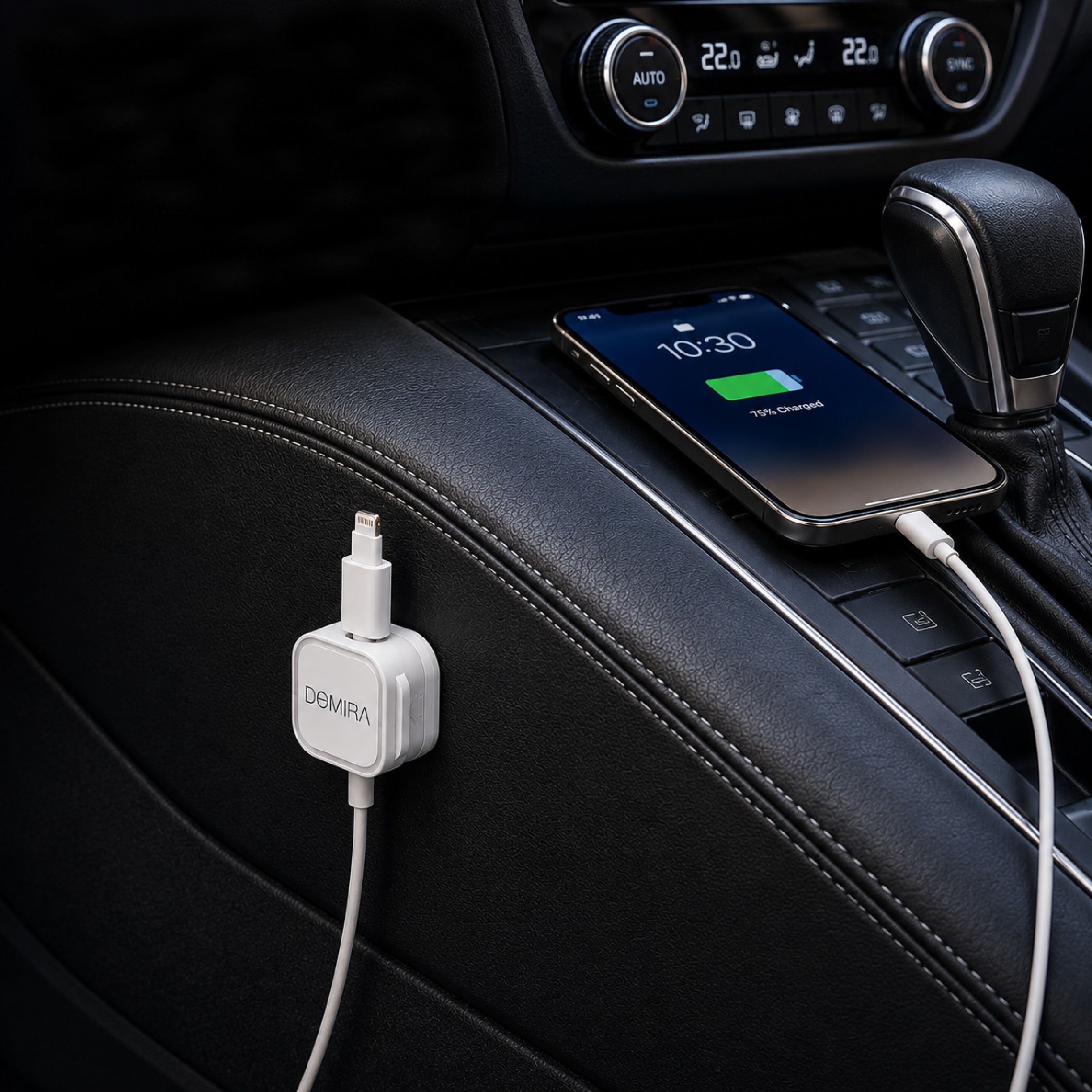 DOMIRA White magnetic cable holder
clips used in a car to organise charging
cables, USB cables and AUX cords.