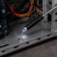 LED magnetic pickup tool recovering a
dropped screw from an electronic device,
demonstrating precision retrieval in
confined spaces.