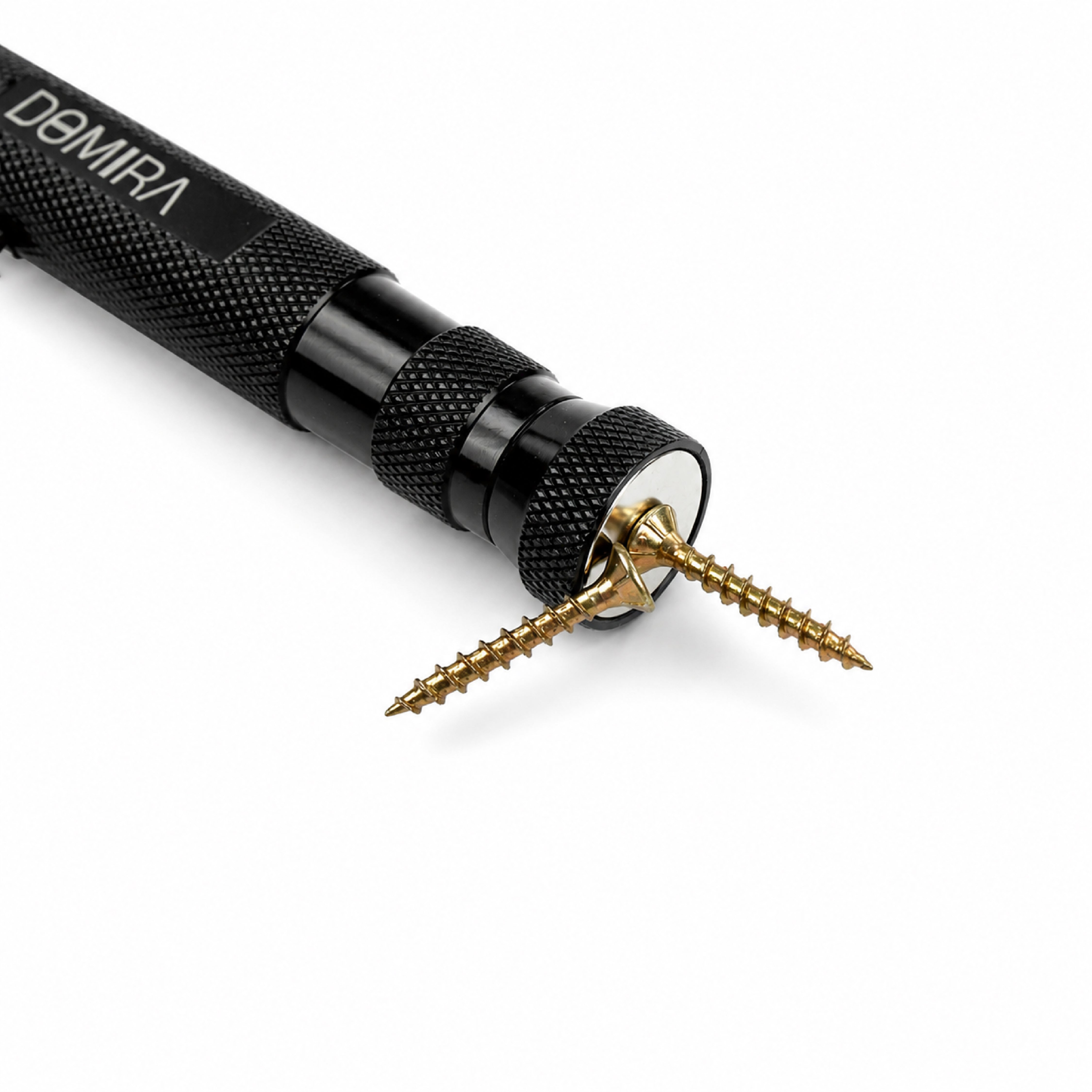 Close-up of the magnetic base lifting
nails, demonstrating the strong magnetic
pickup capability of the DOMIRA LED
magnetic pickup tool.