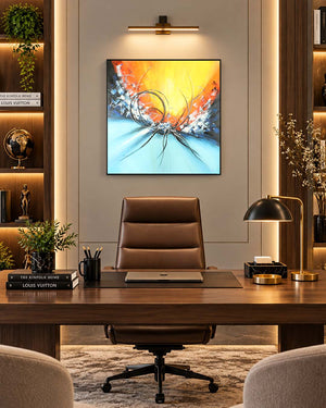 Elemental orange and turquoise abstract painting in a home office