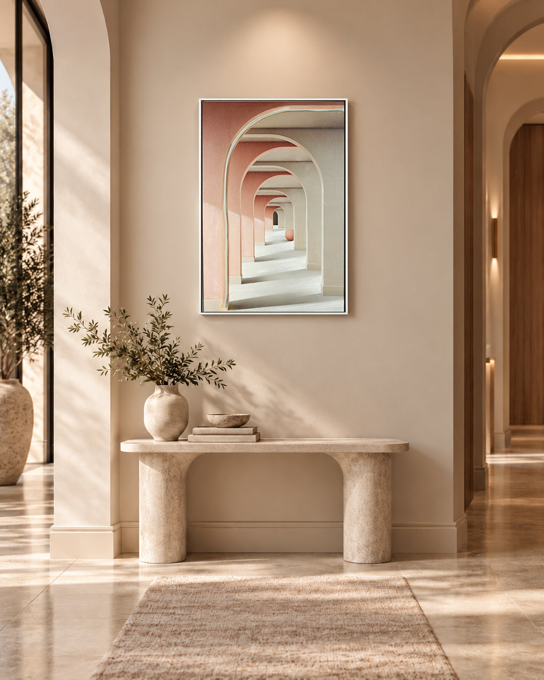 Endless pink arch LED wall art in a hallway above a console