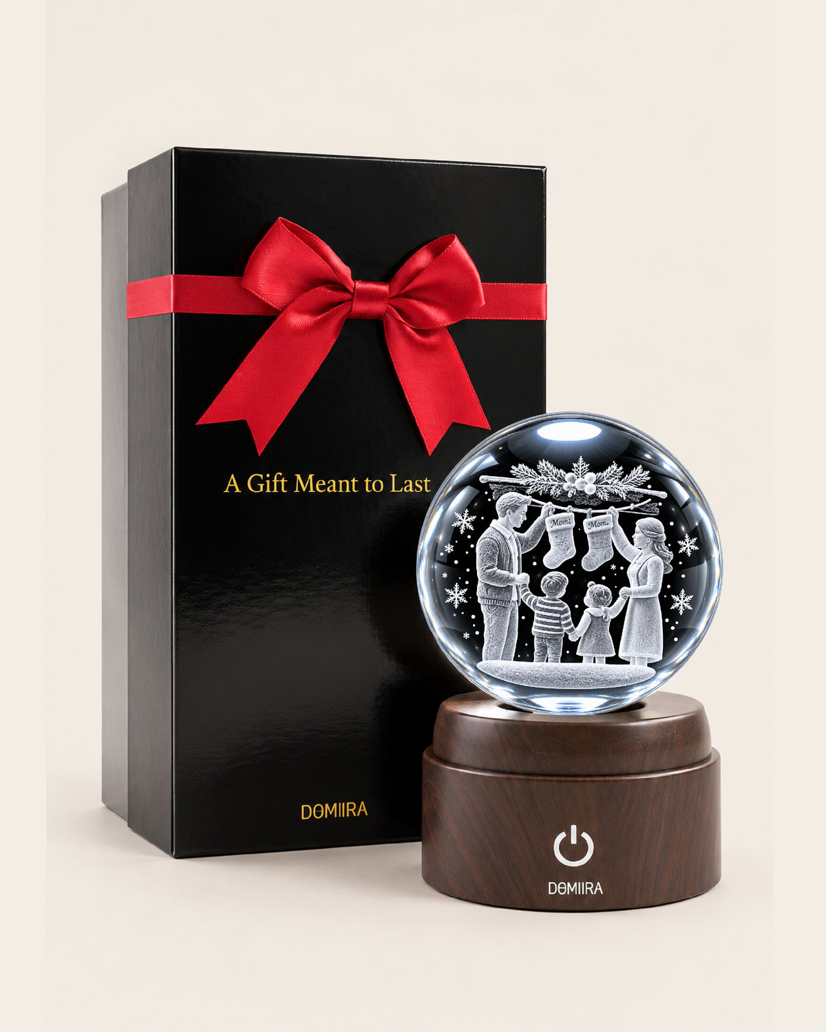 Christmas Traditions crystal globe beside its ribbon-finished gift box