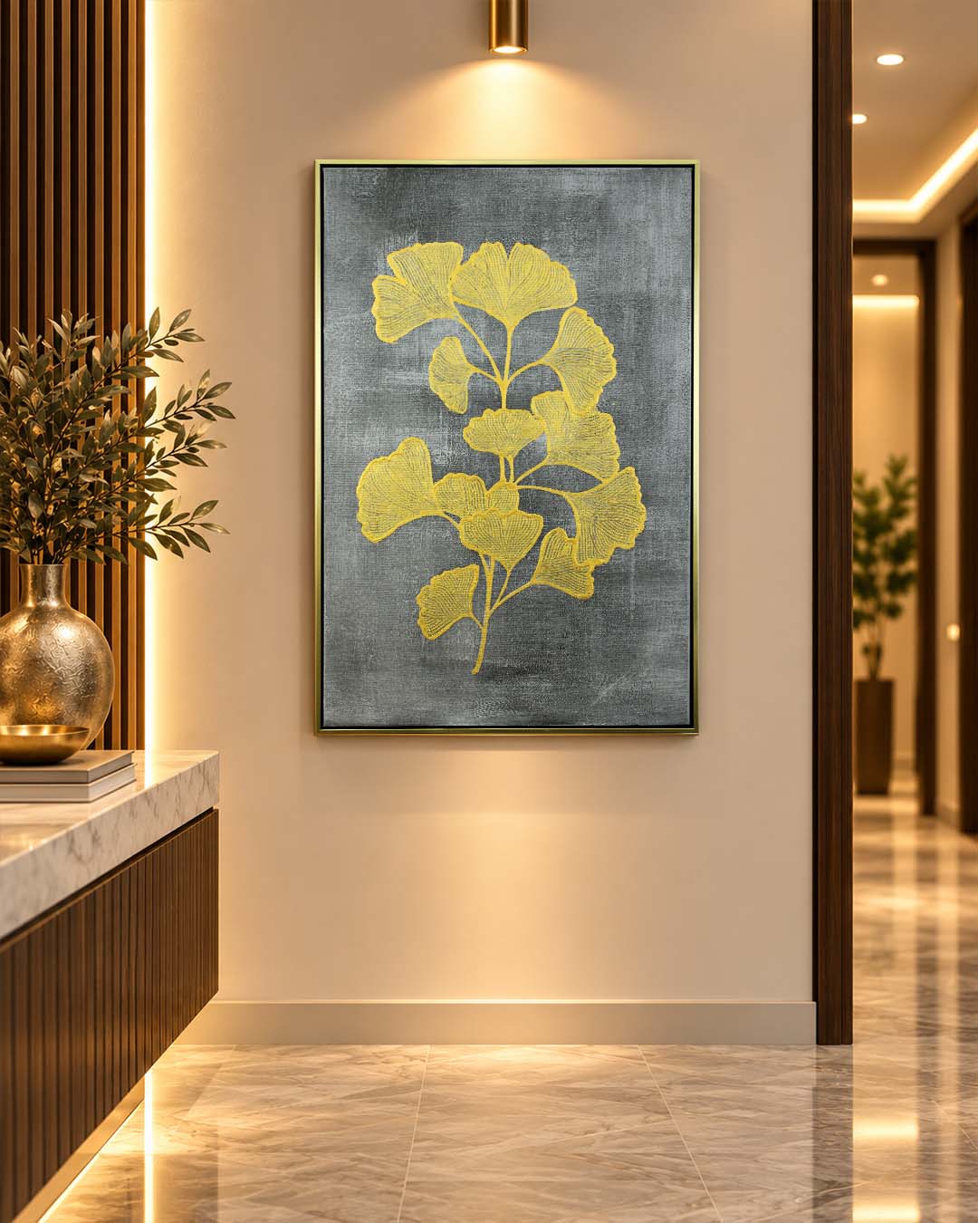 Gilded Ginkgo gold foliage wall art above a console table in a hallway