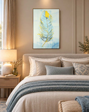 Golden Quill feather canvas art above a bed in a bedroom