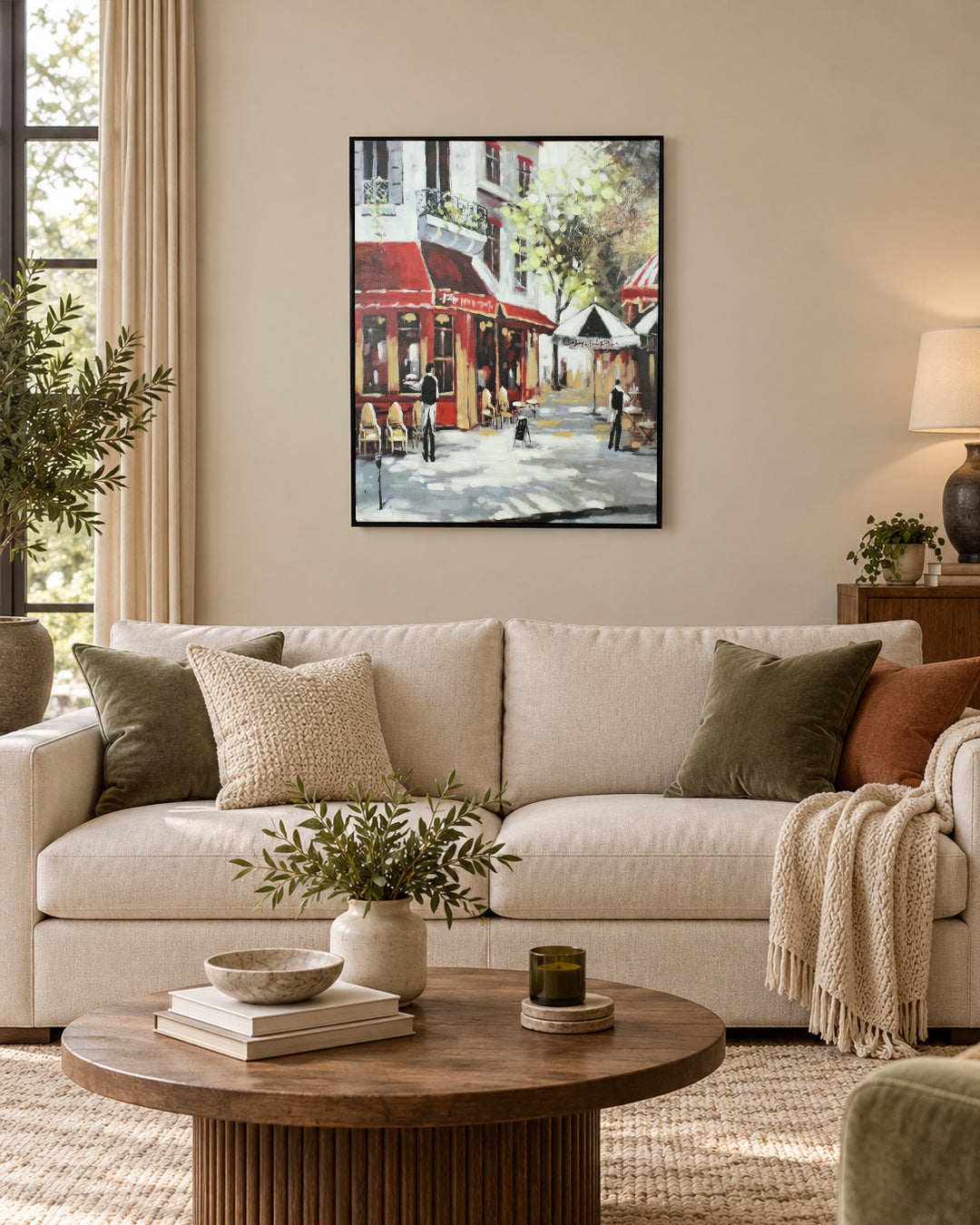 La Terrasse parisian bistro wall art above a sofa in a living room