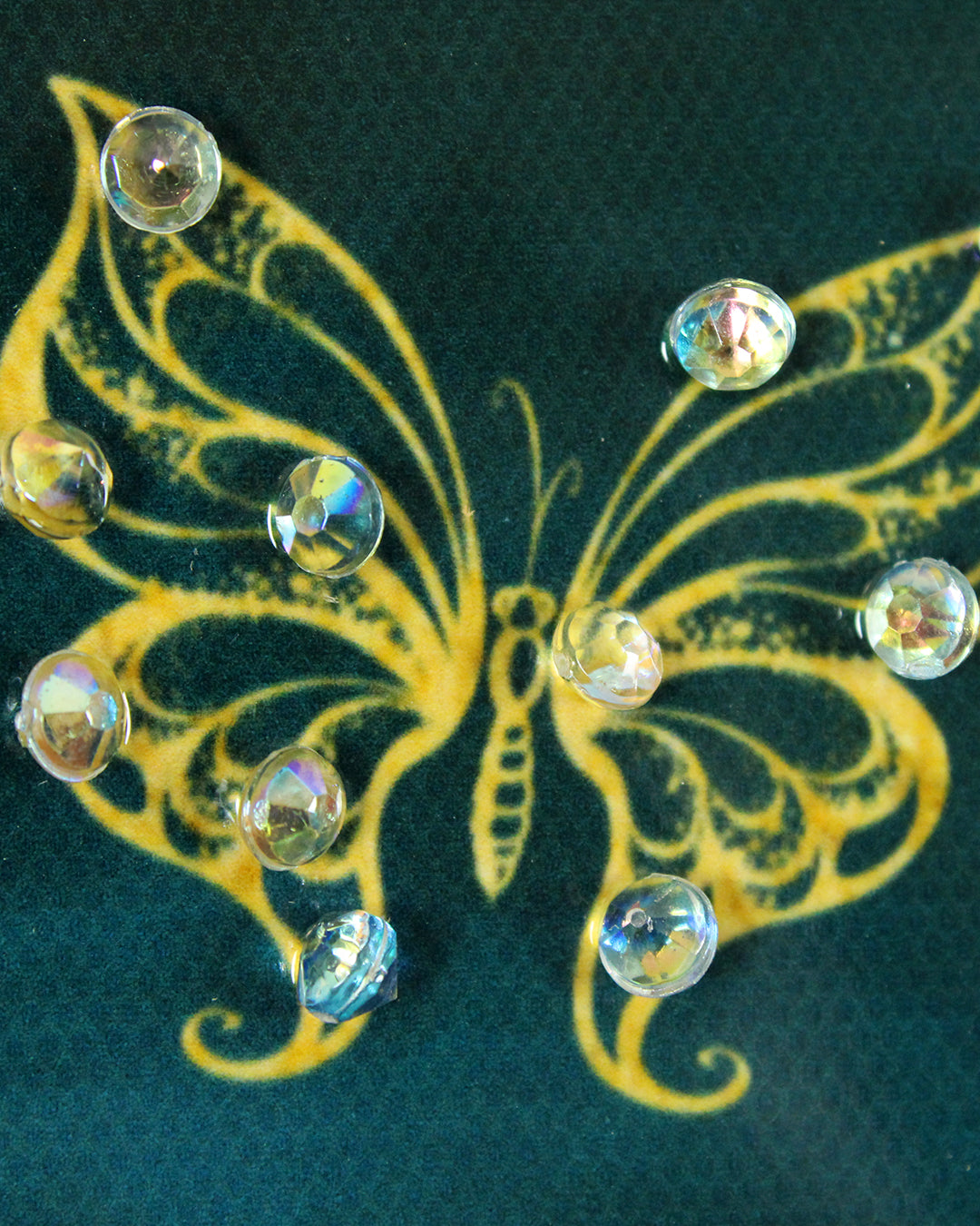 Lapis Aloft butterfly resin wall art close-up of a gold butterfly and crystals
