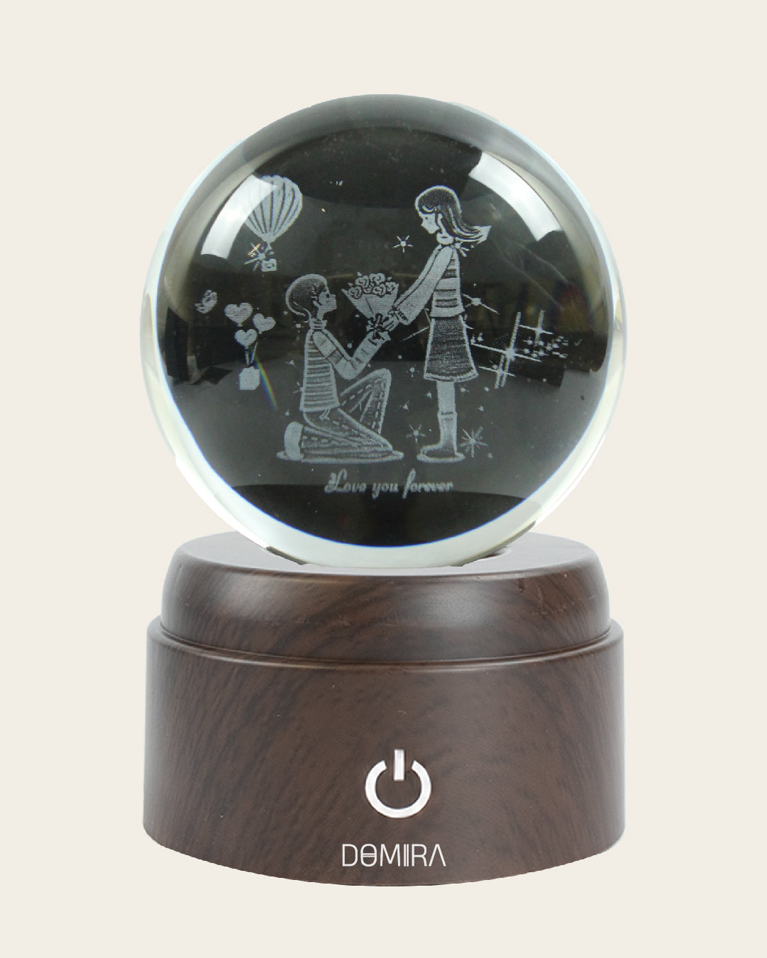 A Promise of Love crystal globe close-up of the 3D engraved design