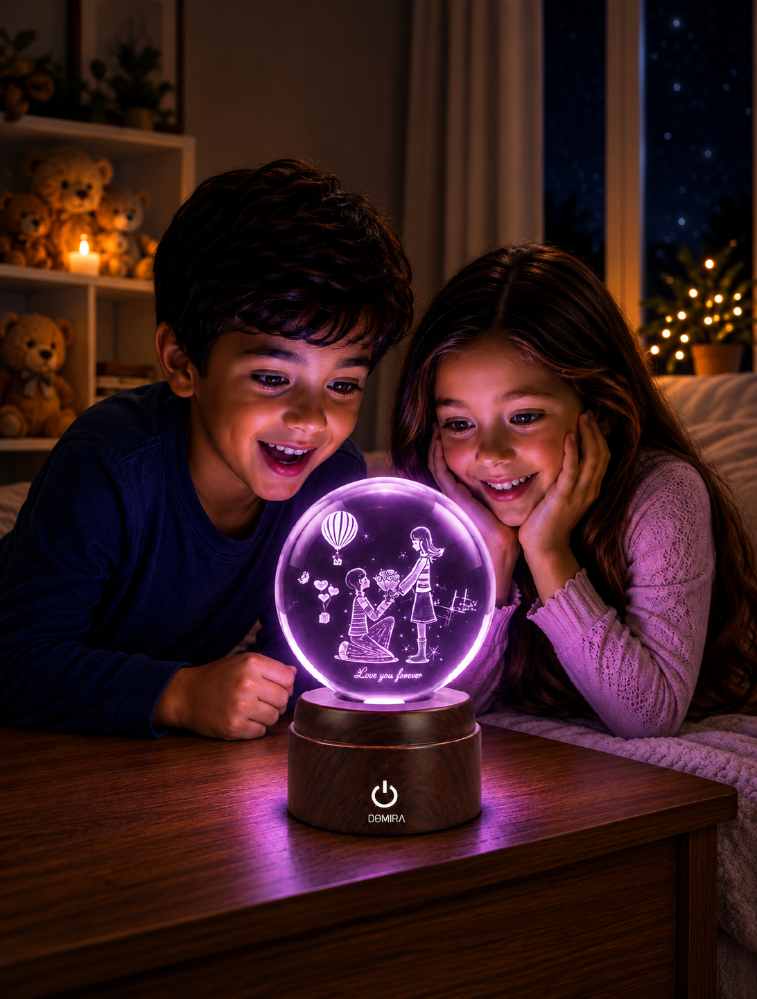 Two children admiring the A Promise of Love crystal globe