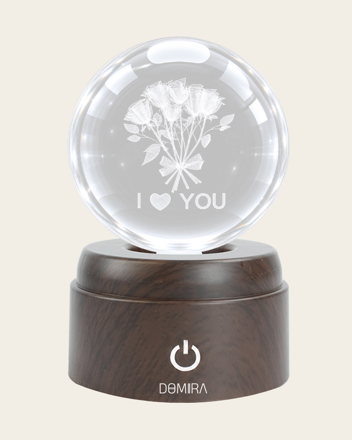 A Thousand Roses crystal globe front view on its rotating LED base