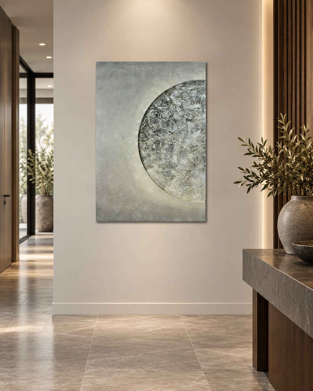 Lunar Reverie illuminated moon canvas art in a hallway above a console