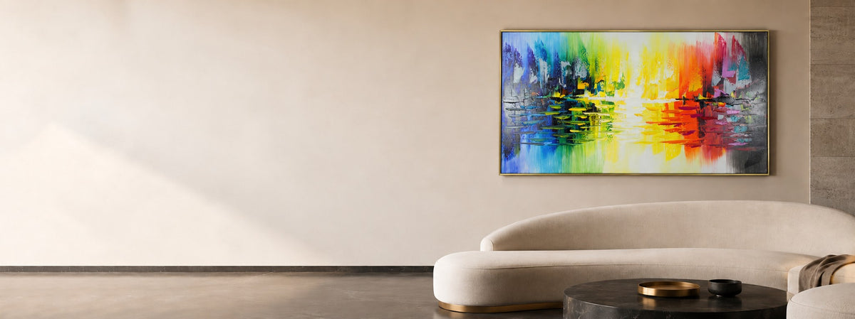 Prism colourful abstract wall art above a curved sofa in a living room