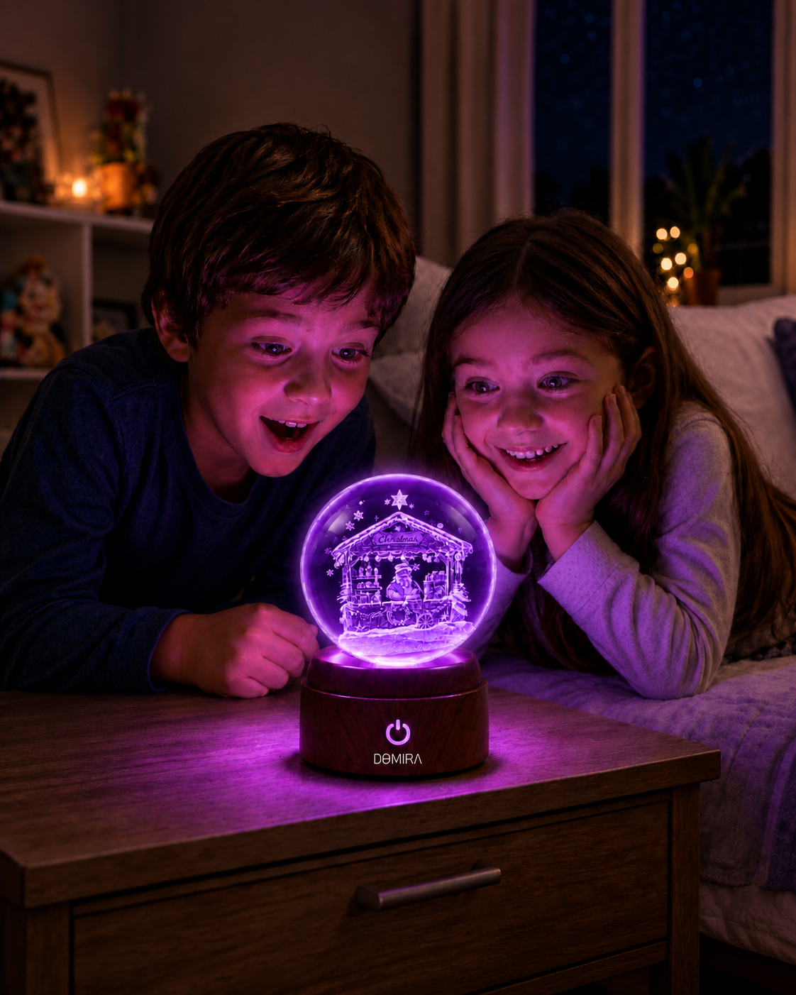 Two children admiring the Christmas Market crystal globe