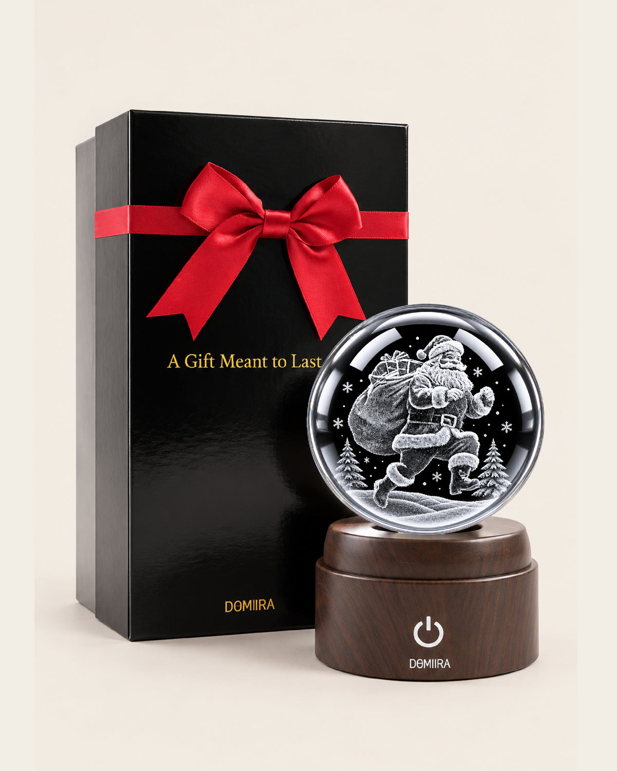 Midnight Santa crystal globe beside its ribbon-finished gift box