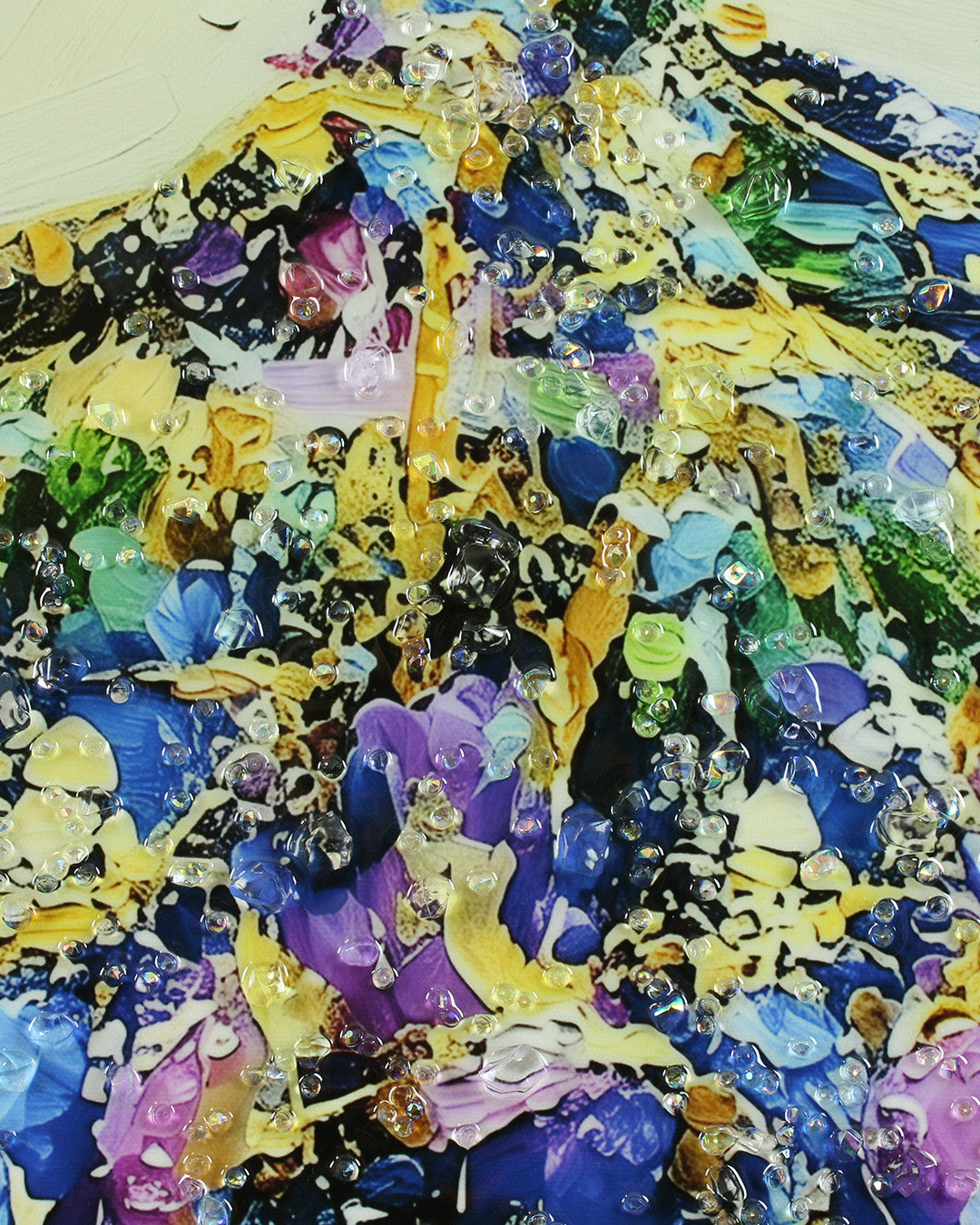 She Arrived woman resin wall art close-up of the colourful gown under resin