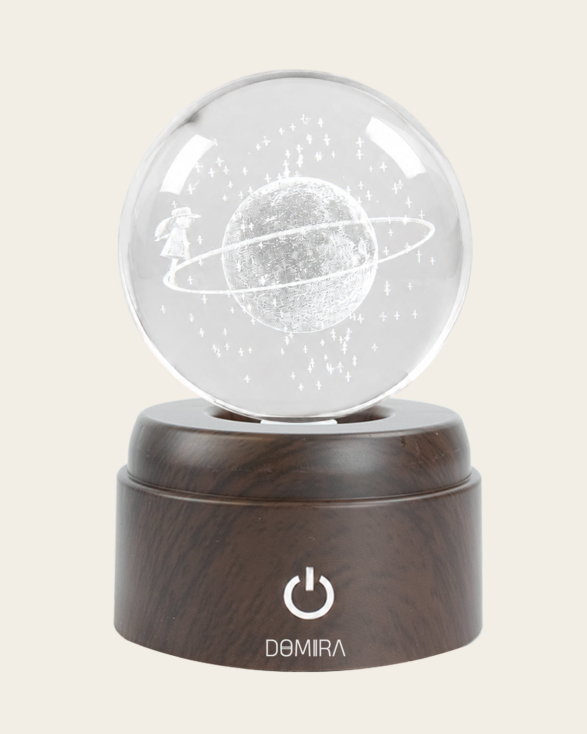 Orbital Dreams crystal globe front view on its rotating LED base