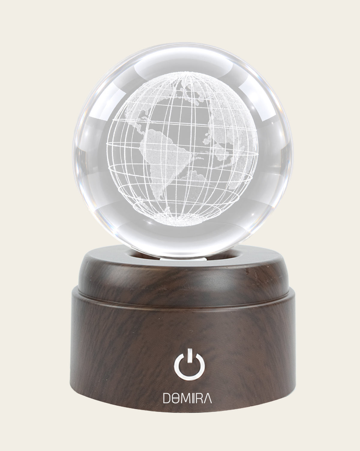 Our Planet crystal globe front view on its rotating LED base