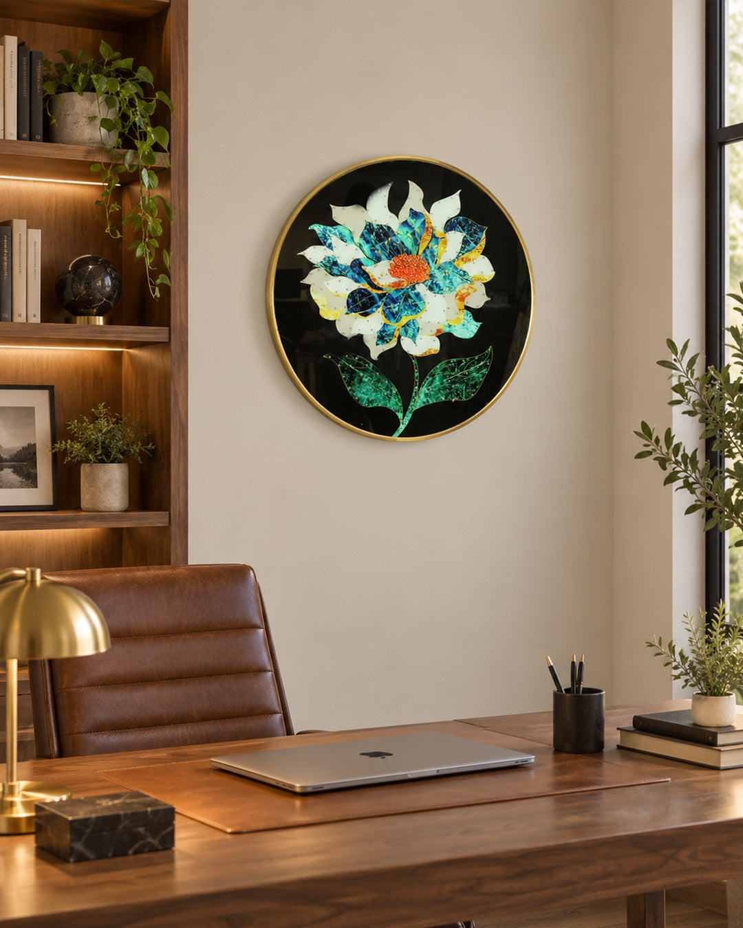 Splendour round navy and gold floral glass wall art in a home office