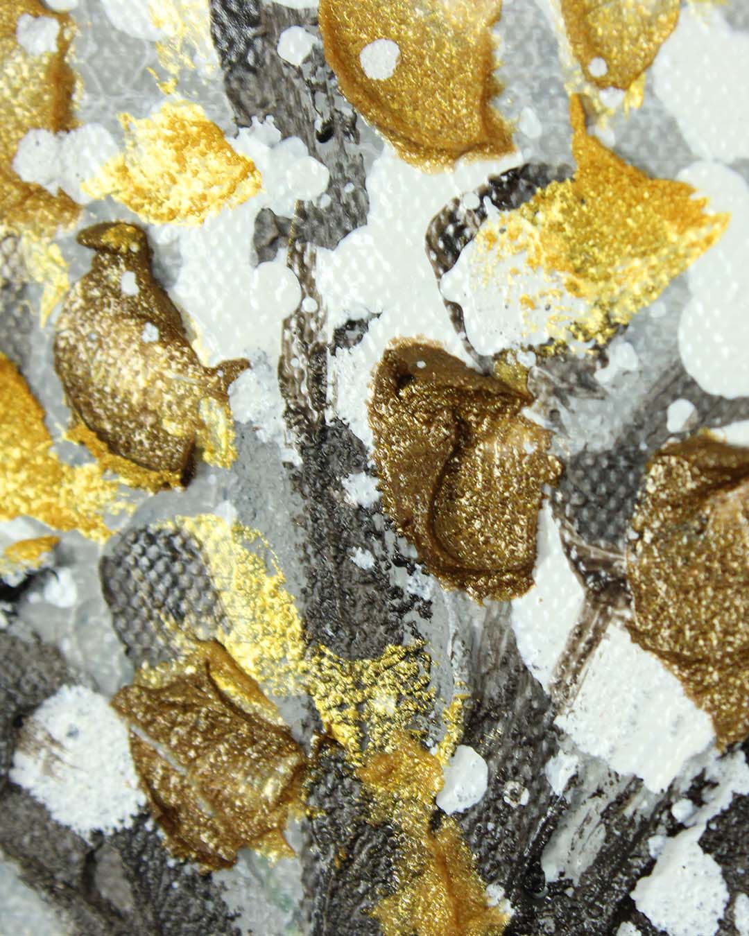 Close-up of raised gold leaf texture