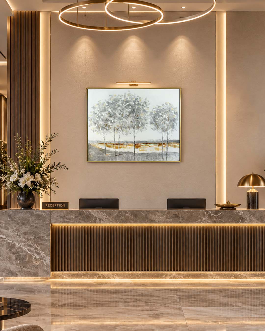 The Quiet Grove silver birch painting in a hotel reception