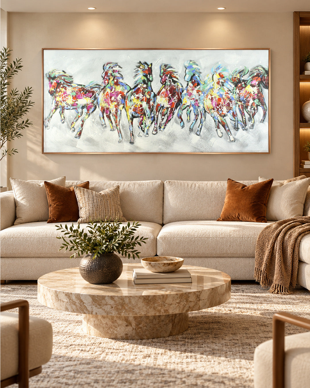 The Seven Horses equestrian wall art above a sofa in a living room