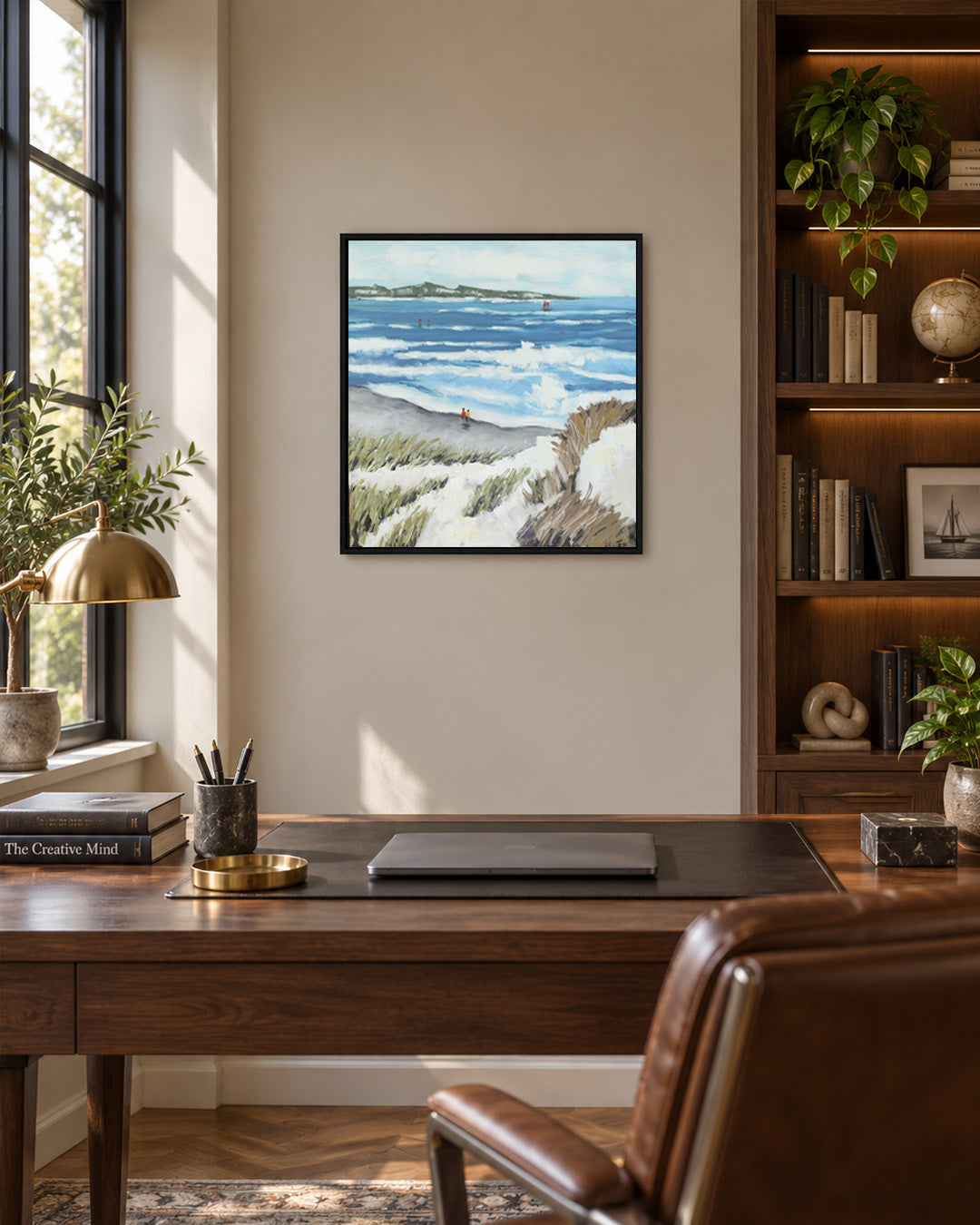 The Tide Between Us beach painting in a home office