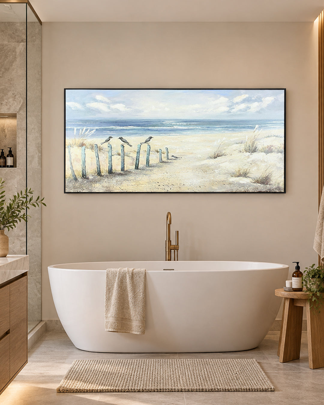 The Turning beach posts wall art in a bathroom beside a freestanding bath