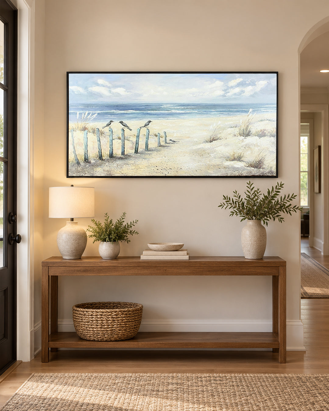 The Turning beach posts wall art above a console table in a hallway