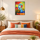 The Unsaid cubist face LED wall art above a bed in a bedroom