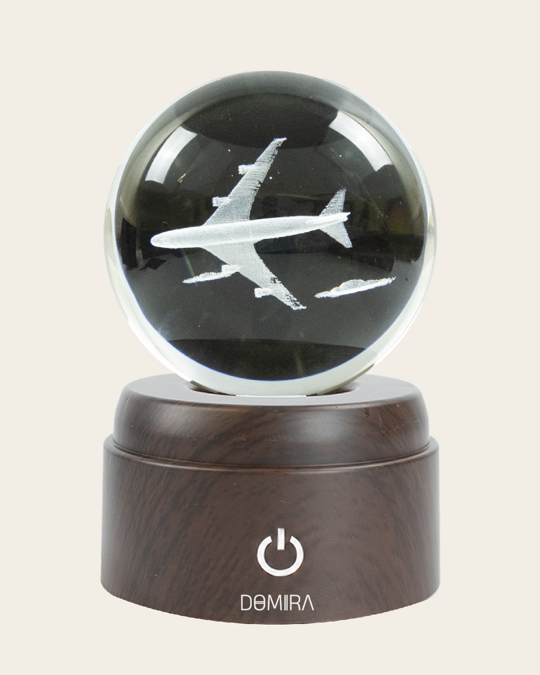 Chasing Horizons crystal globe close-up of the 3D engraved design