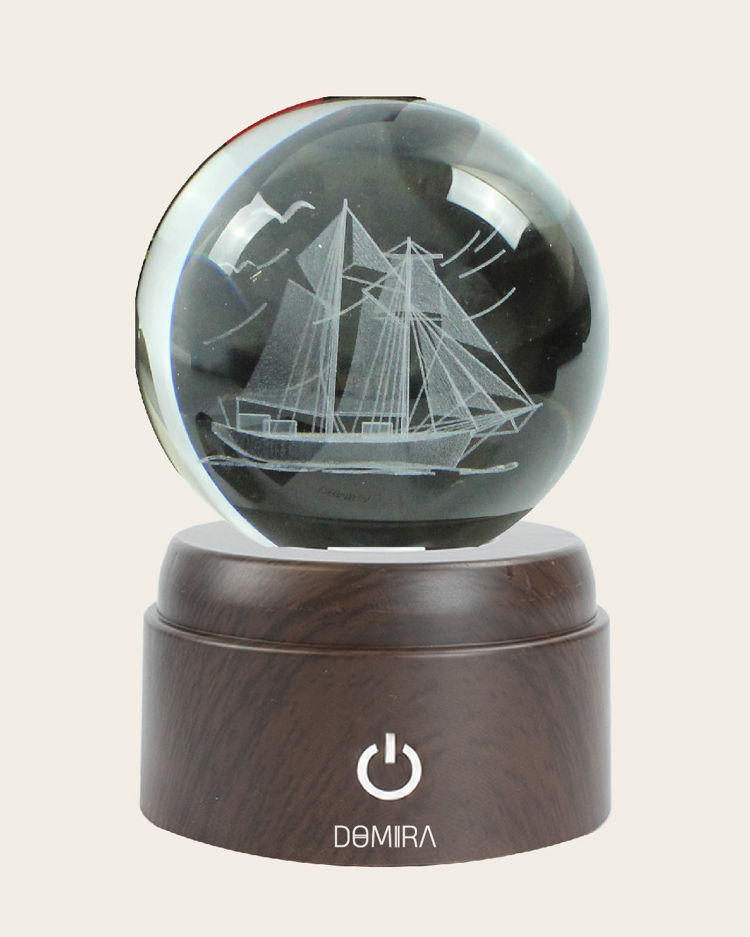 Ocean Wanderer crystal globe close-up of the 3D engraved design