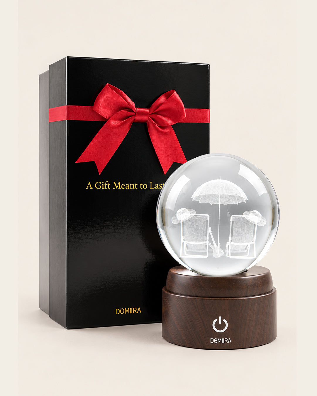 Seaside Escape crystal globe beside its ribbon-finished gift box
