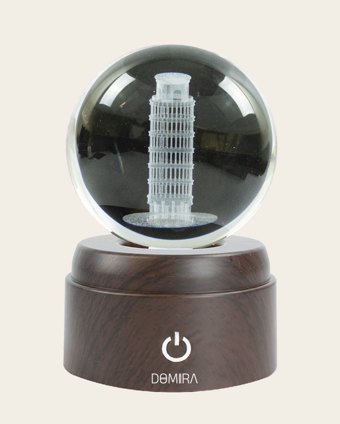 The Leaning Wonder crystal globe close-up of the 3D engraved design