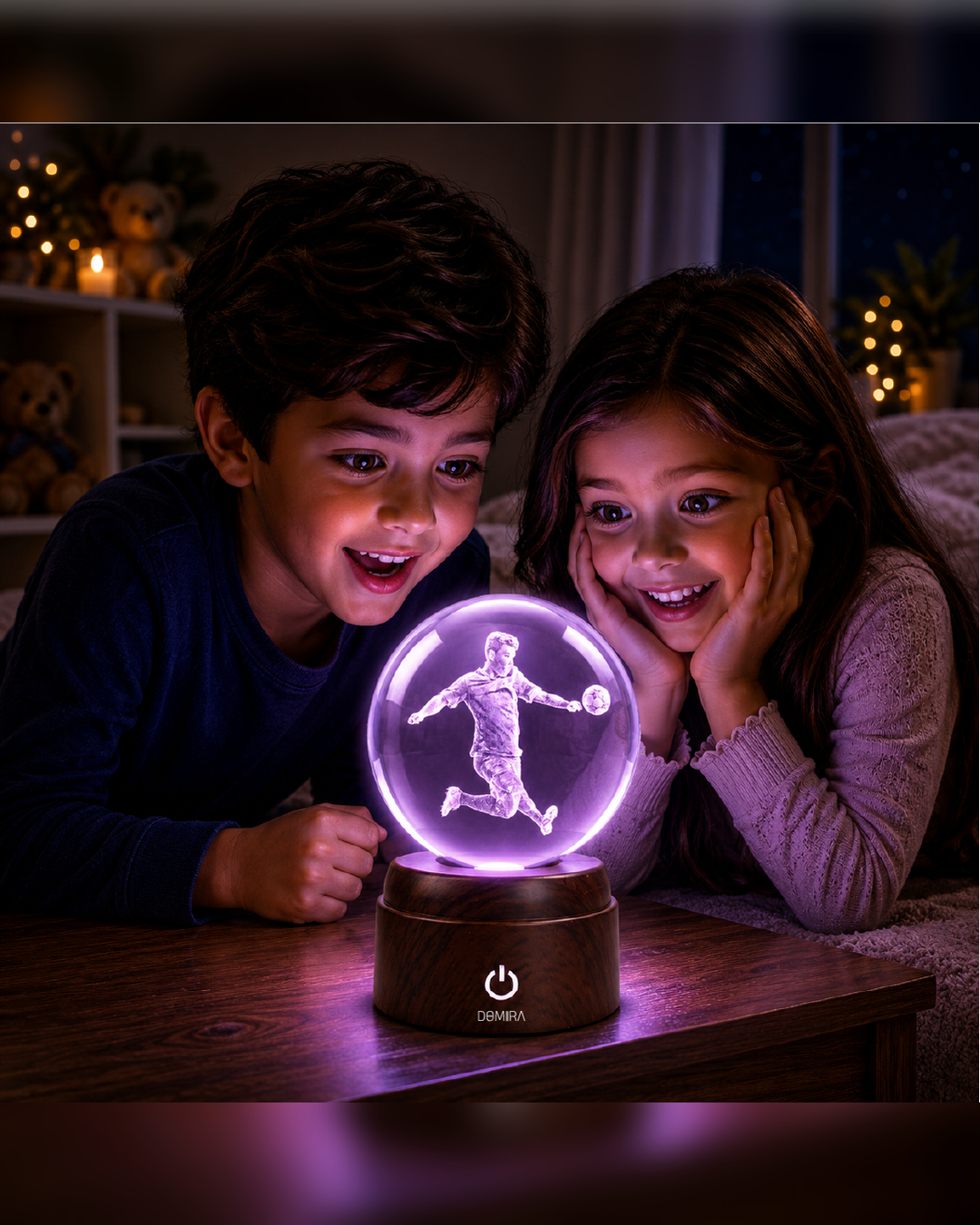 Two children admiring the Victory Kick crystal globe